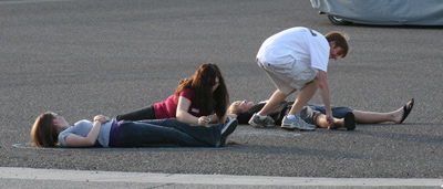 Chalk outlines in the road
